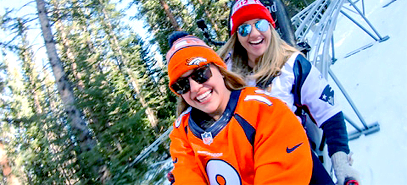 Two Women riding Snowmass Alpine Coaster during winter in Snowmass, Colorado
