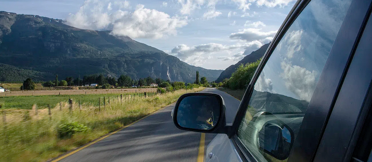 car driving to Aspen in open fields